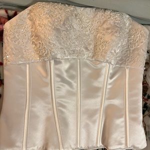 A David Bridal dress. Size 8 and never been worn. Smoke free home.